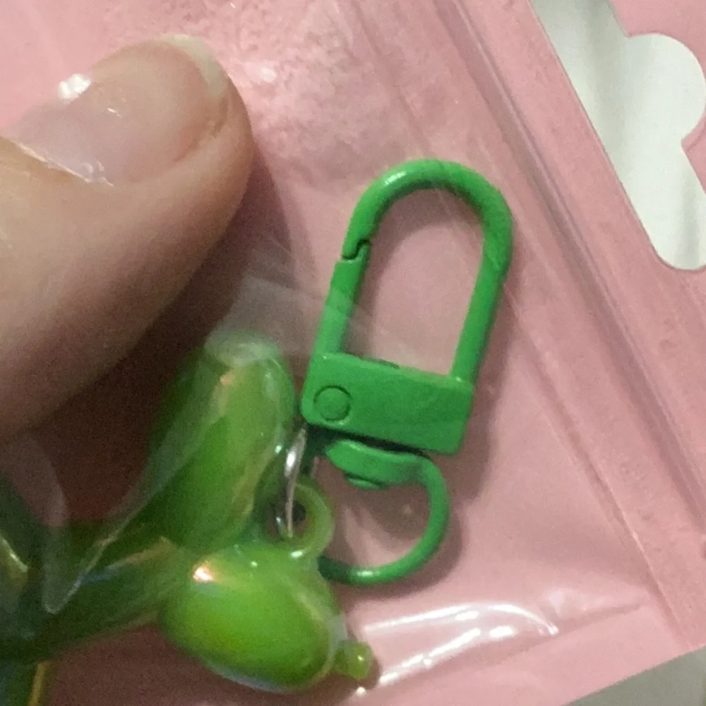 Balloon wiener dog key chain. Green iridescent. New in package